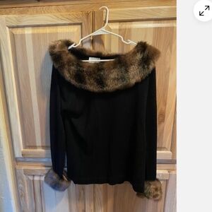 Stunning vintage black sweater with faux mink collar & cuffs. Size large.